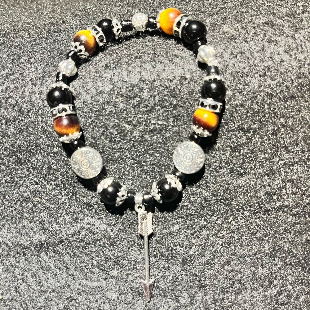Tiger eye natural stone and glass and Arrow charm